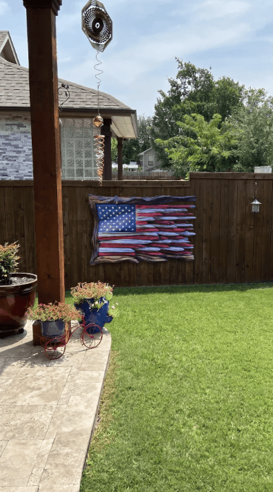 marksflags wooden flag displayed — Backyard & patio